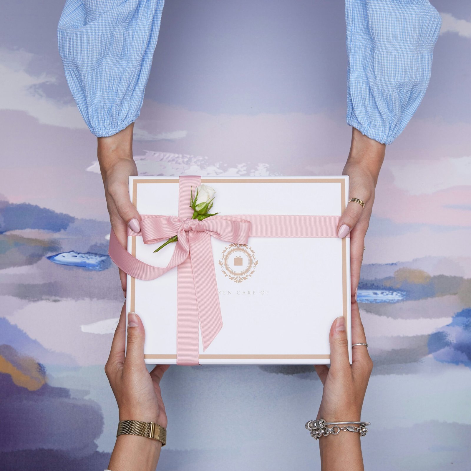 Hands holding cute Asian gift box